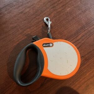 Alcott Retractable Dog Leash 16 Ft Length 65 lb Max has A Couple Of Scratches